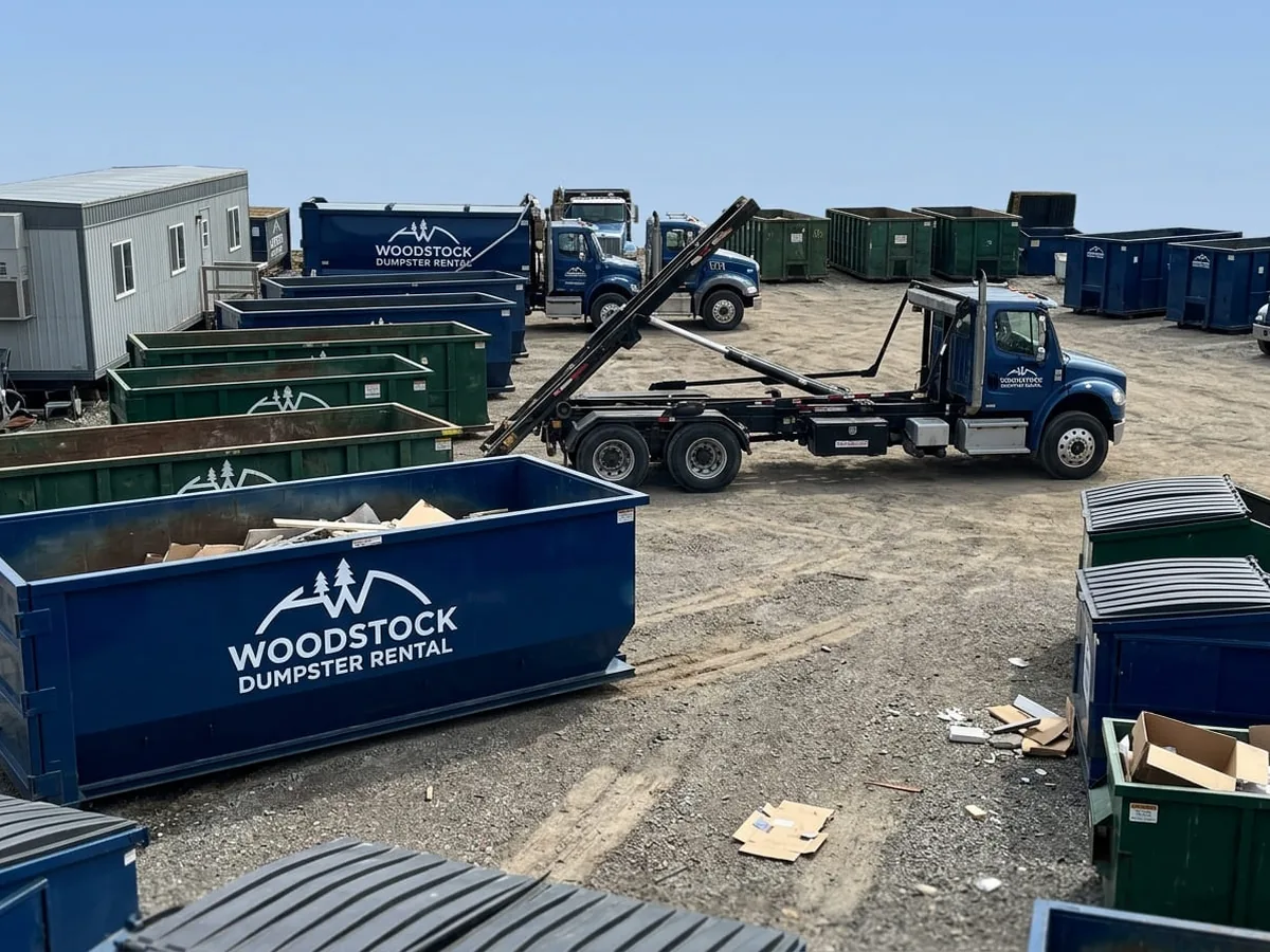 Woodstock Dumpster Rental Group roll-off truck delivering a container in Woodstock, GA